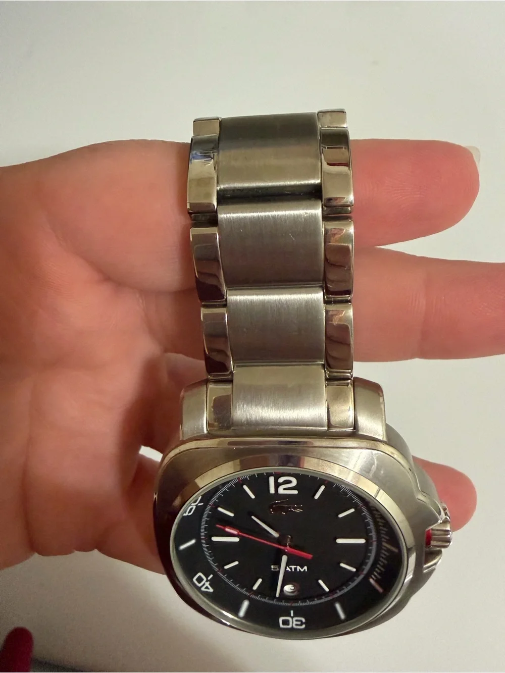 Lacoste Silver Stainless Steel Watch with Black Dial and Red Accents
